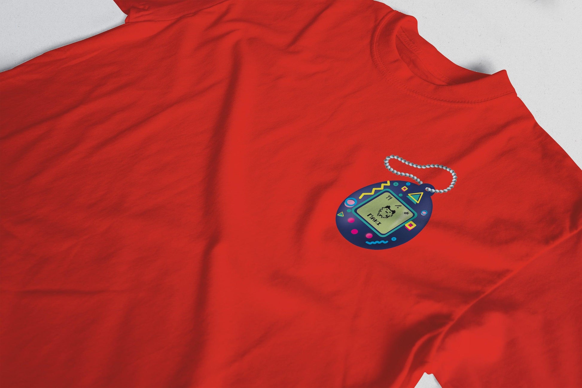 Tamagotchis POCKET T SHIRT - UrbanHangers